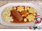 Geschmorte Rinderrouladen mit  Klößen in Sternform, nappiert mit  Maronensauce. - Rezept