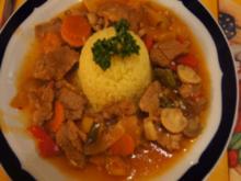 Schweinefilet süß-sauer mit Gemüse und Curry-Reis - Rezept