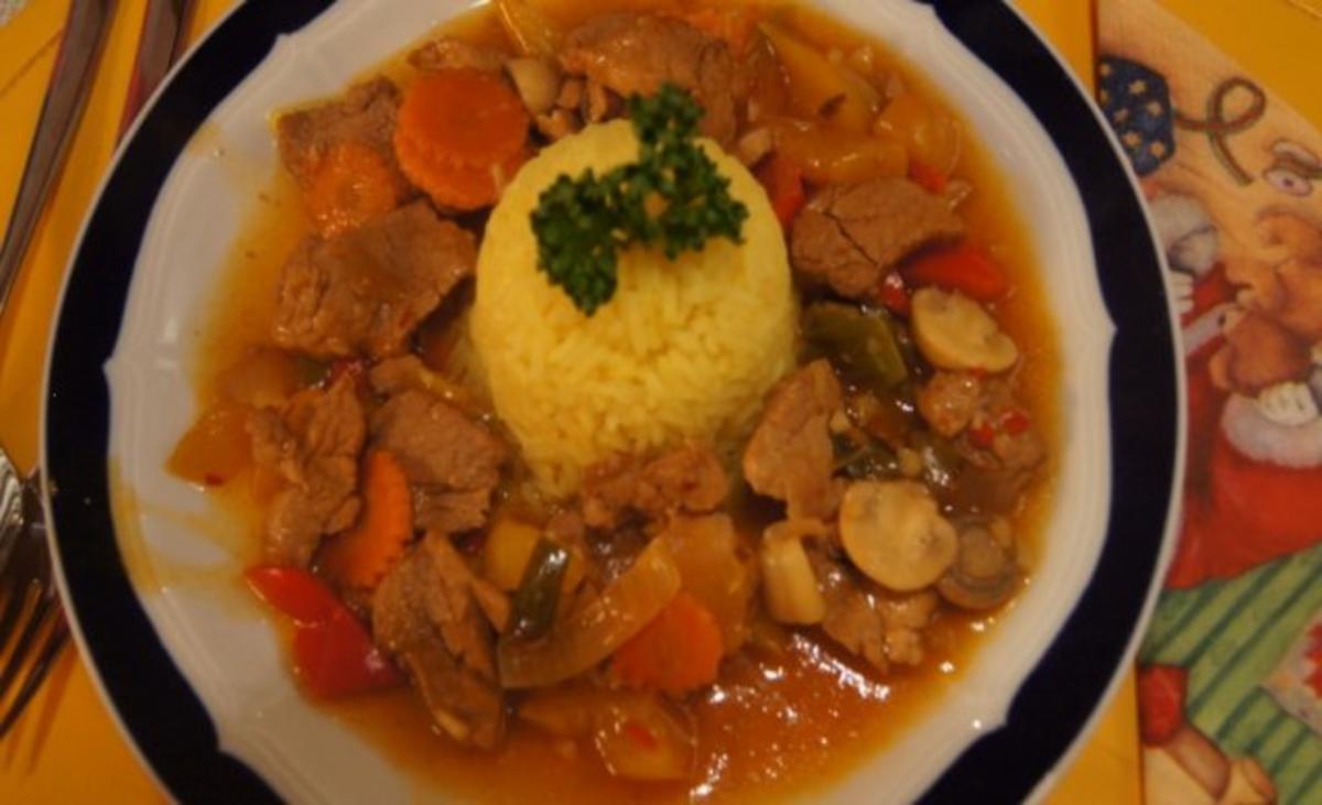 Bilder für Schweinefilet süß-sauer mit Gemüse und Curry-Reis - Rezept