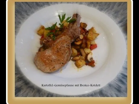Rezept: Kartoffel-Champignonpfanne mit Ibericokotelett Kartoffel-Champignonpfanne mit Ibericokotelett - Rezept