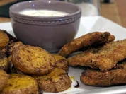 Schweineschnitzel in Nusspanade, Backofenkartoffeln - Rezept