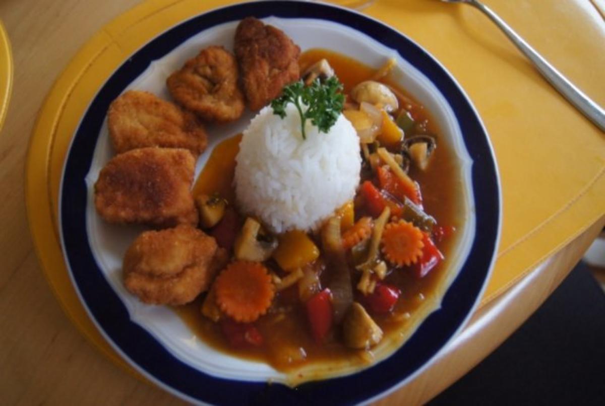 Chicken Nuggets mit Wokgemüse süß-sauer und Reis - Rezept - kochbar.de