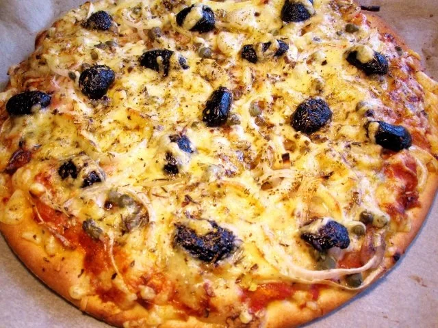 Pizza nach Art des Hauses - Rezept