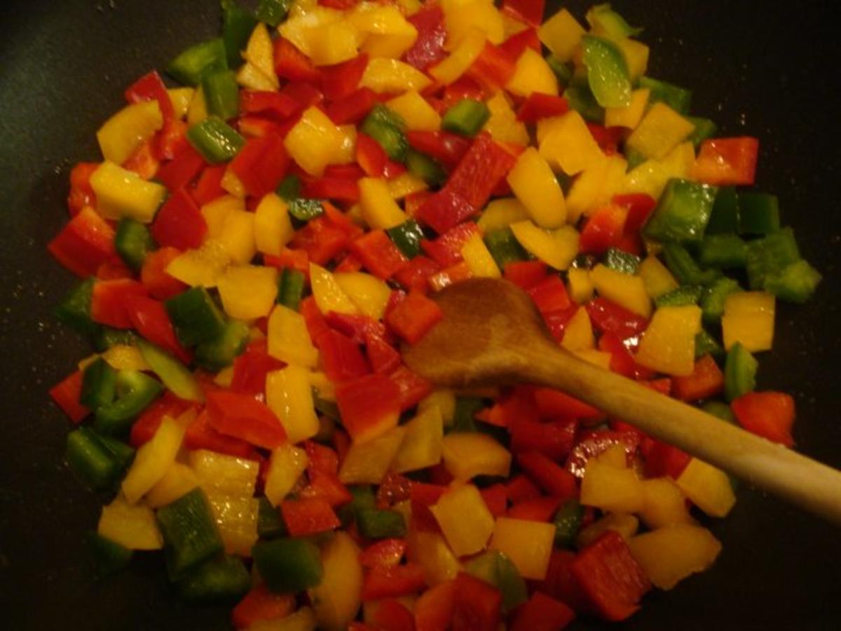 Tomaten-Paprika-Reis mit Minutensteaks und Kräuterbutter - Rezept - Bild Nr. 4