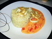 Calamariringe auf pikantem Paprikabett mit Zitronenbulgur - Rezept