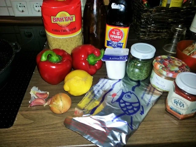 Calamariringe auf pikantem Paprikabett mit Zitronenbulgur - Rezept - Bild Nr. 2