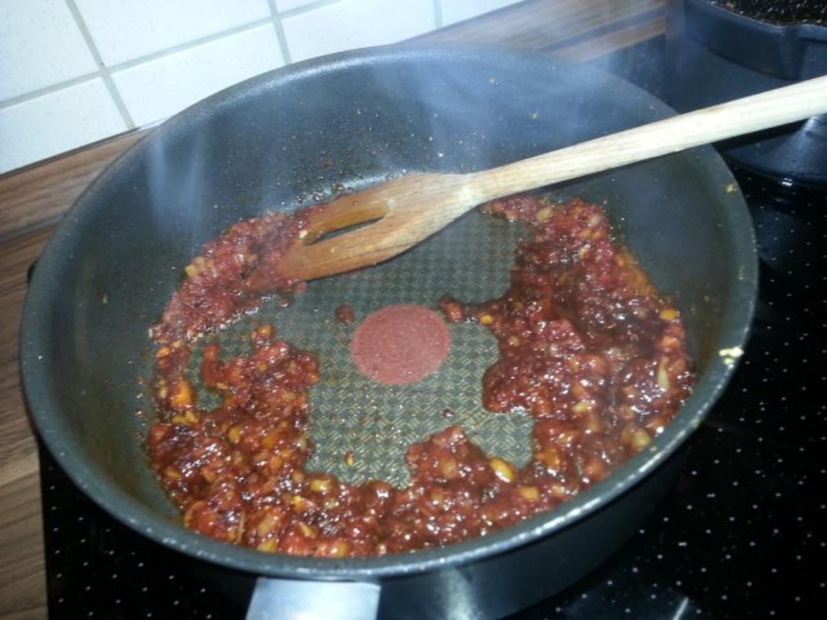 Cannelloni mit cremiger Hackfleischfüllung überbacken mit Tomatensugo - Rezept - Bild Nr. 7