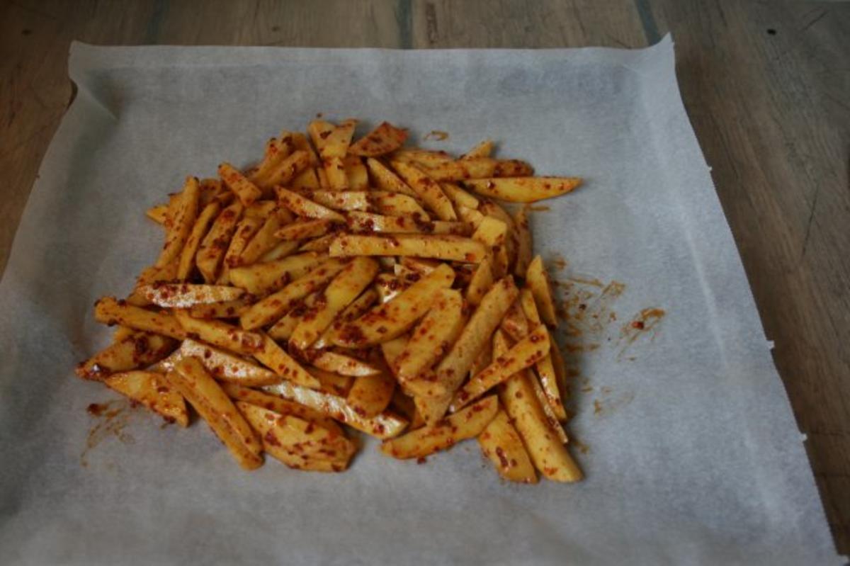 Hähnchen mit Kartoffelspalten, mit Harissa eingerieben - Rezept - Bild Nr. 3