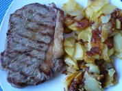 Rezept: Rumpsteak mit Schmorkartoffeln Rumpsteak mit Schmorkartoffeln - Rezept