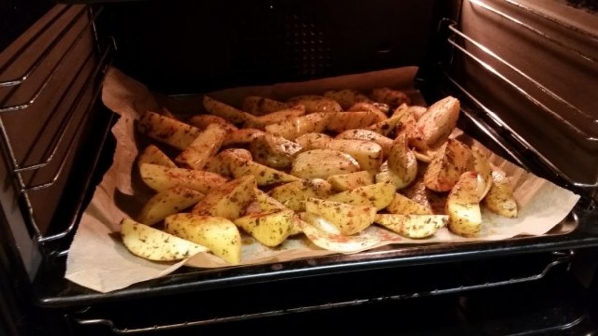 Ofenkartoffeln mit Kotelett und Käuterbutter - Rezept - Bild Nr. 4