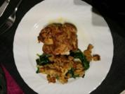 Hähnchenschenkel auf Spinat mit Parmesankrusti - Rezept