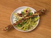 Löwenzahnsalat mit Ziegenkäse und Kürbiskernstangerl (Vorspeise Willi Gabalier) - Rezept
