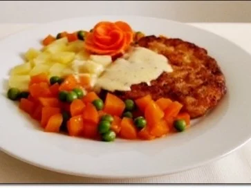 Paniertes Schweinesteak mit Gemüse,  nappiert mit „Café de Paris Sauce“ - Rezept - Bild Nr. 2