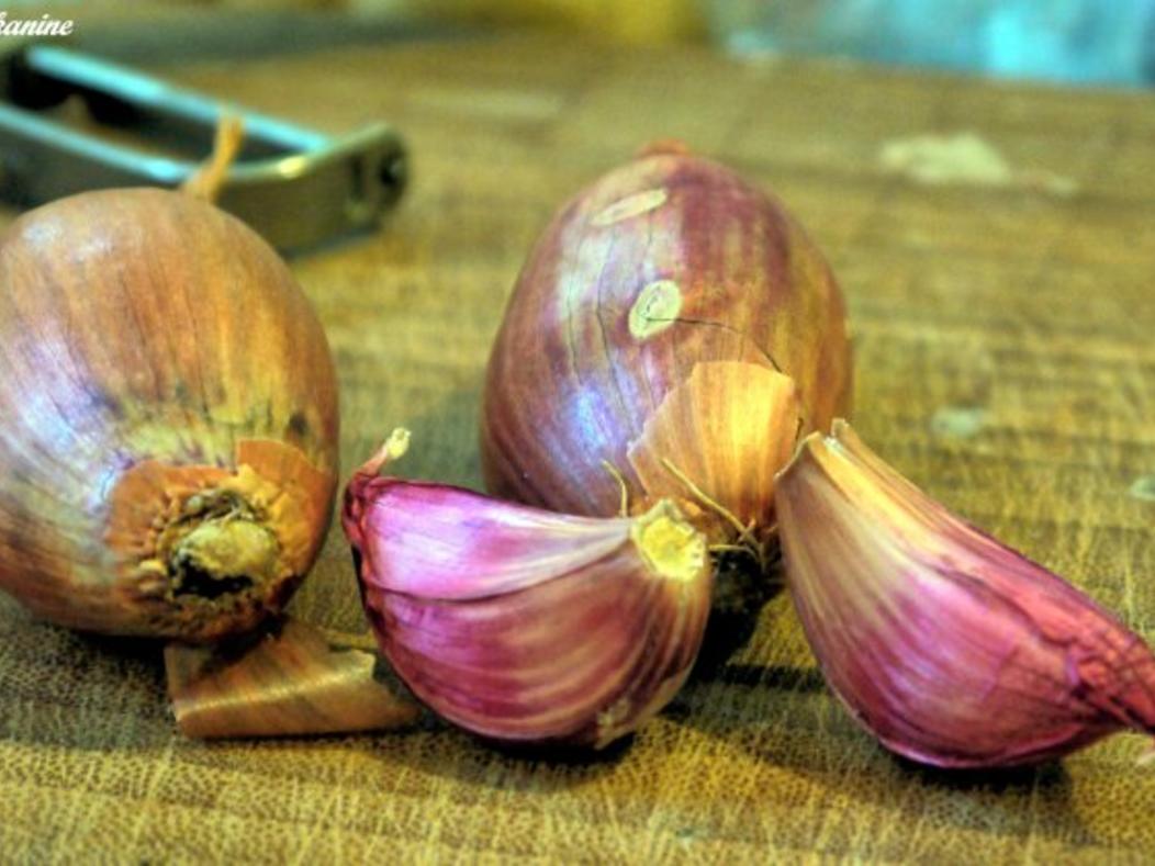 Geschmorte Hühnerherzen mit Kartoffel-Knoblauch-Stampf - Rezept