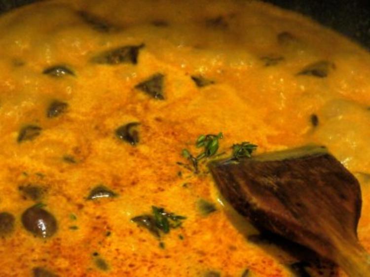 Geschmorte Hühnerherzen mit Kartoffel-Knoblauch-Stampf - Rezept