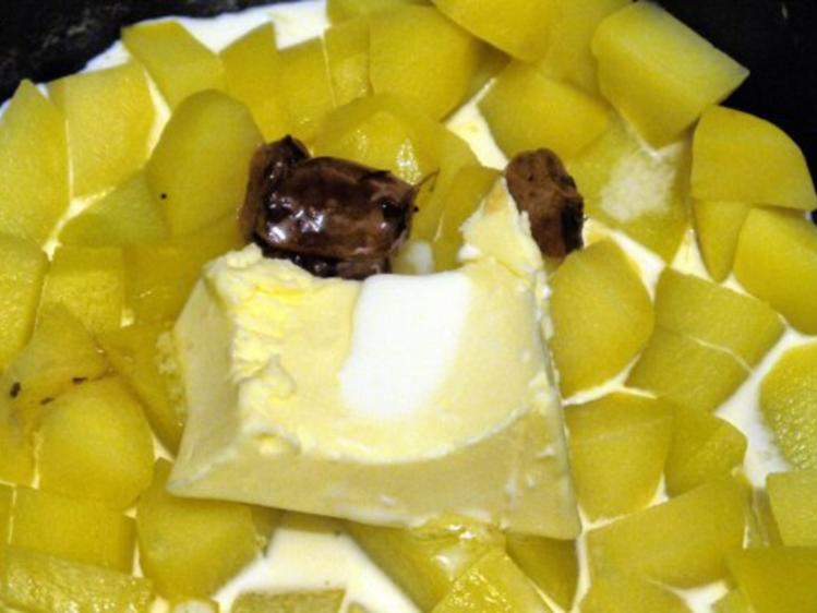 Geschmorte Hühnerherzen mit Kartoffel-Knoblauch-Stampf - Rezept
