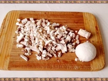 Rezept: Gefüllte Kartoffelklöße mit Sauerkraut und Champignons nach Art des Hauses Bild Nr. 6 Gefüllte Kartoffelklöße mit Sauerkraut und Champignons nach Art des Hauses - Rezept - Bild Nr. 6