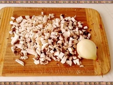 Rezept: Gefüllte Kartoffelklöße mit Sauerkraut und Champignons nach Art des Hauses Bild Nr. 7 Gefüllte Kartoffelklöße mit Sauerkraut und Champignons nach Art des Hauses - Rezept - Bild Nr. 7