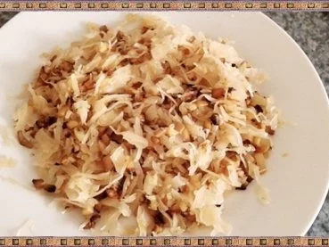 Rezept: Gefüllte Kartoffelklöße mit Sauerkraut und Champignons nach Art des Hauses Bild Nr. 15 Gefüllte Kartoffelklöße mit Sauerkraut und Champignons nach Art des Hauses - Rezept - Bild Nr. 15