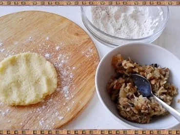 Rezept: Gefüllte Kartoffelklöße mit Sauerkraut und Champignons nach Art des Hauses Bild Nr. 24 Gefüllte Kartoffelklöße mit Sauerkraut und Champignons nach Art des Hauses - Rezept - Bild Nr. 24