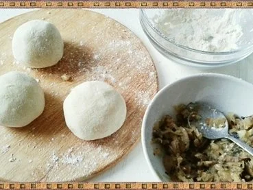 Rezept: Gefüllte Kartoffelklöße mit Sauerkraut und Champignons nach Art des Hauses Bild Nr. 29 Gefüllte Kartoffelklöße mit Sauerkraut und Champignons nach Art des Hauses - Rezept - Bild Nr. 29