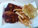 Würzige panierte Schweinesteaks mit Pommes - Rezept