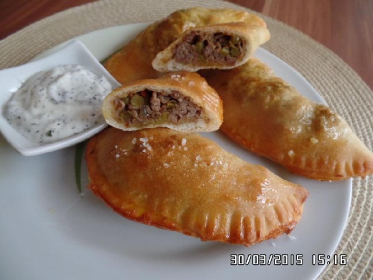 Bilder für Empanadas Pizzateig-Taschen gefüllt mit Hackfleisch-Erbsen -Mix - Rezept