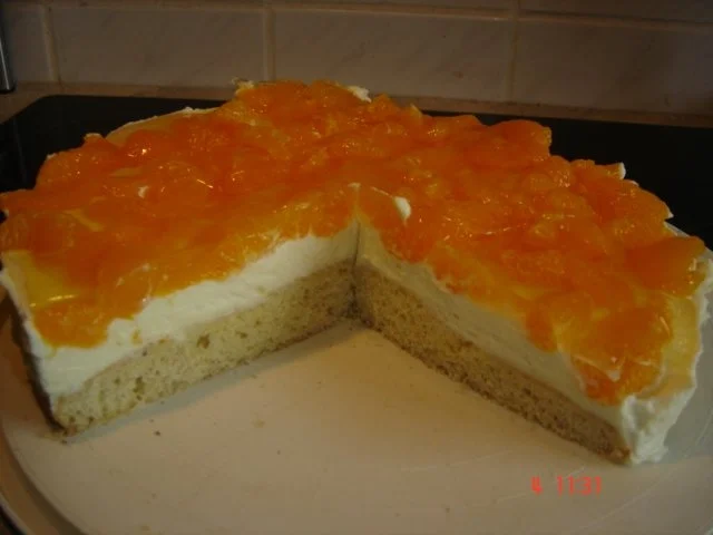 Rezept: Weiße Schokoladensahne mit Mandarinen Bild Nr. 2 Weiße Schokoladensahne mit Mandarinen - Rezept - Bild Nr. 2