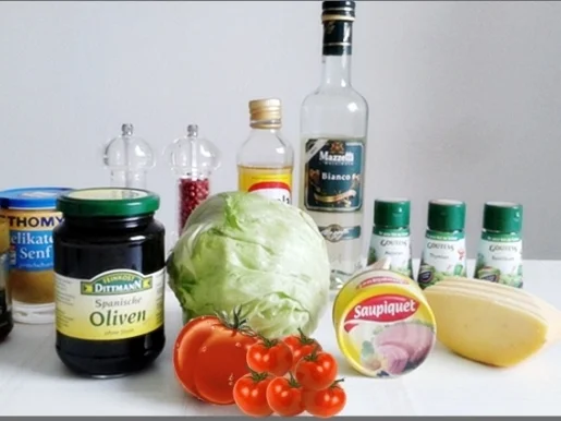 Eisbergsalat mit Thunfisch, Tomaten,  Gurken  und …. - Rezept - Bild Nr. 740