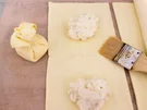 Grana Padano-Säckchen mit Lachsfilet auf Zucchinigemüse - Rezept - Bild Nr. 2192