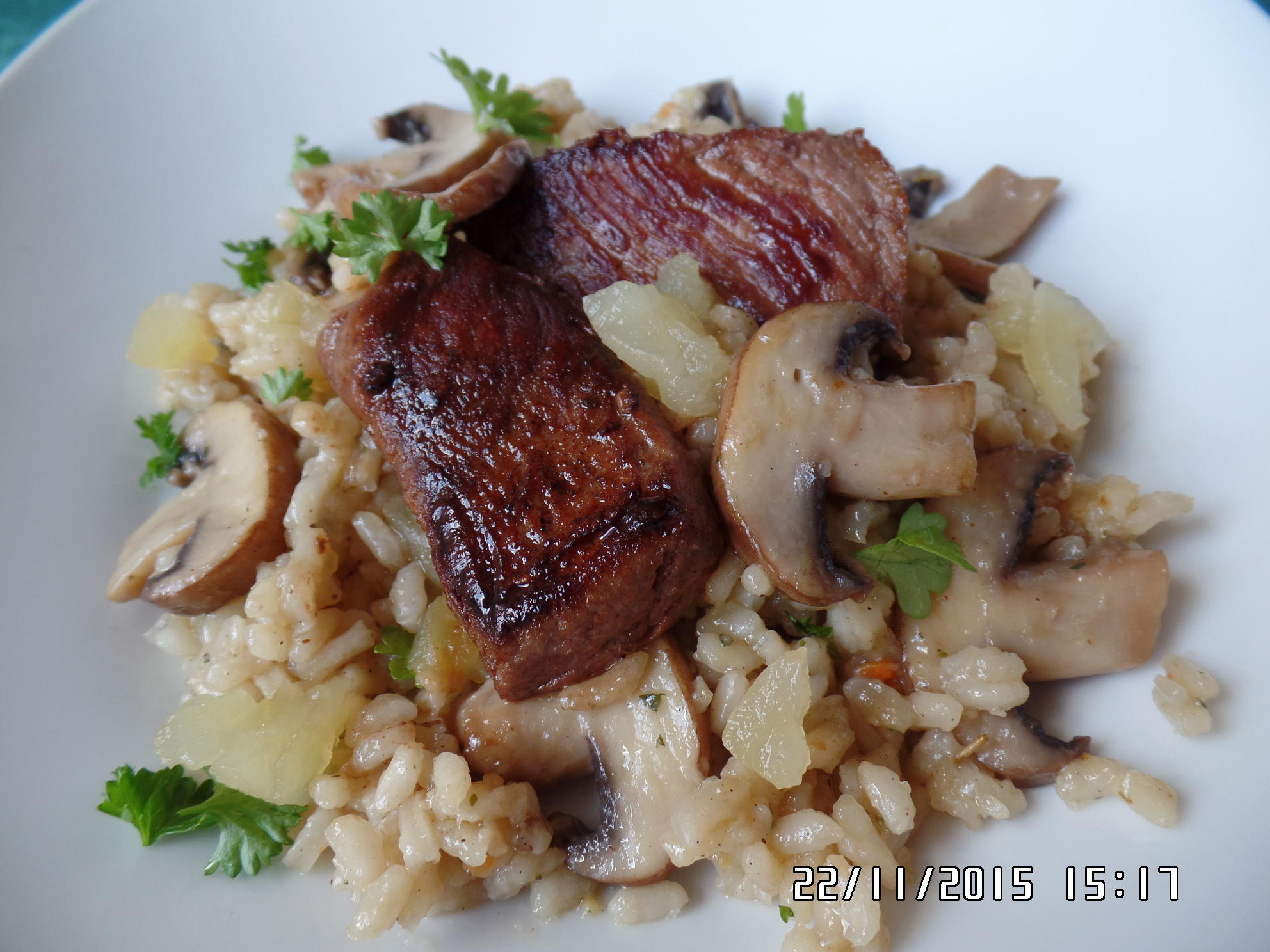 Bilder für Rehrückenfilet mit Champignons-Risotto - Rezept