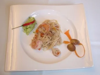 Rezept: Spaghettini mit Meeresfrüchten an Avocadotatar Spaghettini mit Meeresfrüchten an Avocadotatar - Rezept