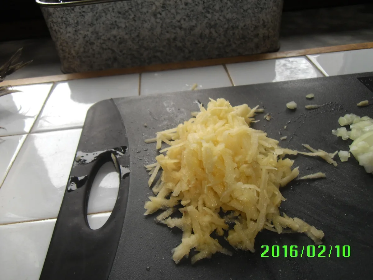 Rezept: Matjesfiltes in Marinade mit Pellkartoffeln und Eisbergsalat Bild Nr. 4525 Matjesfiltes in Marinade mit Pellkartoffeln und Eisbergsalat - Rezept - Bild Nr. 4525