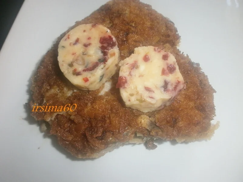 Rezept: Cranberrybutter mit grünem Pfeffer Cranberrybutter mit grünem Pfeffer - Rezept