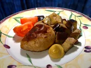 Kalbsadrio (Schweizer Brühwurst) an einer Pilzsauce mit Graffiti-Auberginen - Rezept