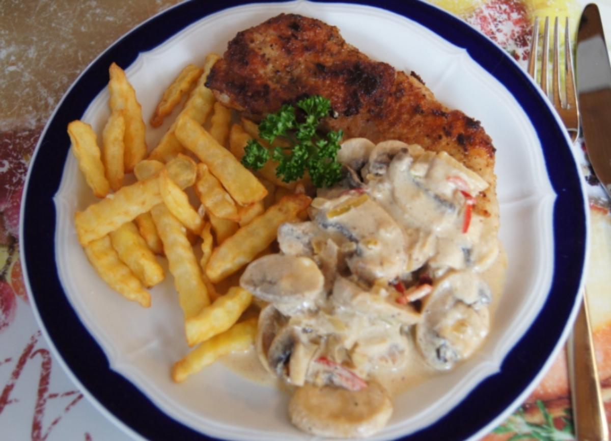 Schnitzel mit Champignonsauce und Pommes frites - Rezept - kochbar.de