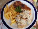 Schnitzel mit Champignonsauce und Pommes frites - Rezept