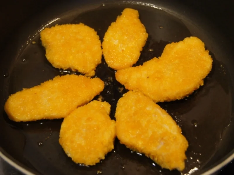 Hähnchenschnitzelchen mit Süßkartoffel-Möhren-Stampf und Rotkraut-Blaukraut - Rezept - Bild Nr. 9