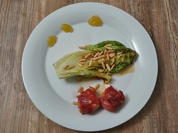 In Serranoschinken gebratener Ziegenkäse an warmem Römersalat mit Feigensenf - Rezept