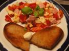 Geröstetes Knoblauchbrot mit gemischten Salat - Rezept