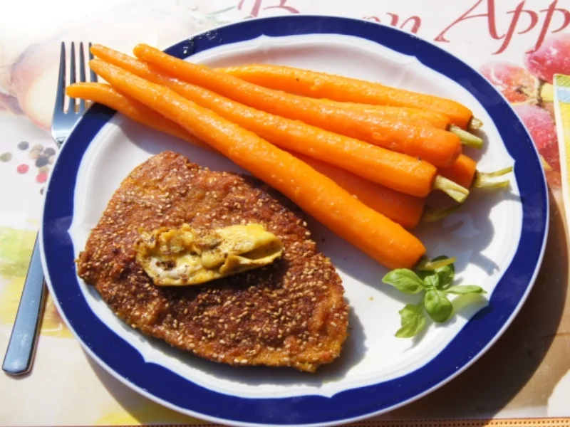 Curry-Sesam-Putenschnitzel mit Honigmöhren - Rezept