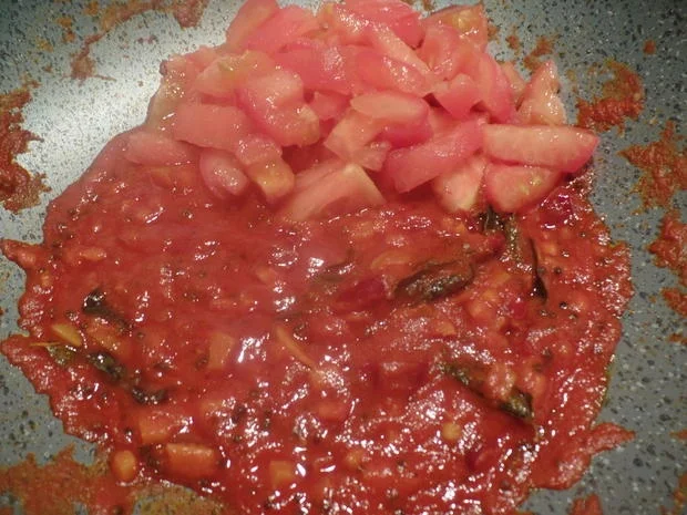 Tintenfischringe in roter Sauce - Rezept - Bild Nr. 9