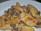 Gratinierte Schupfnudeln in Champignon-Rahm  - Rezept