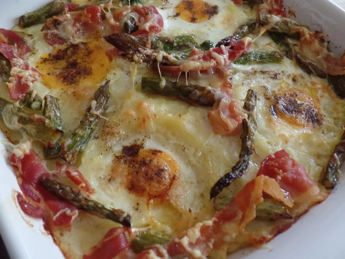 Eier im Kartoffelpüreenest - Rezept