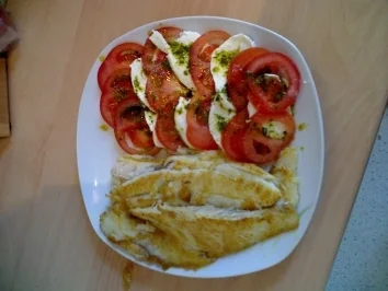 Viktoriabarsch an Tomaten und Mozarella - Rezept