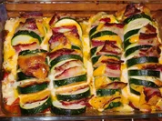 Zucchini- Fächer auf Schmortomaten - Rezept