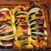 Zucchini- Fächer auf Schmortomaten - Rezept