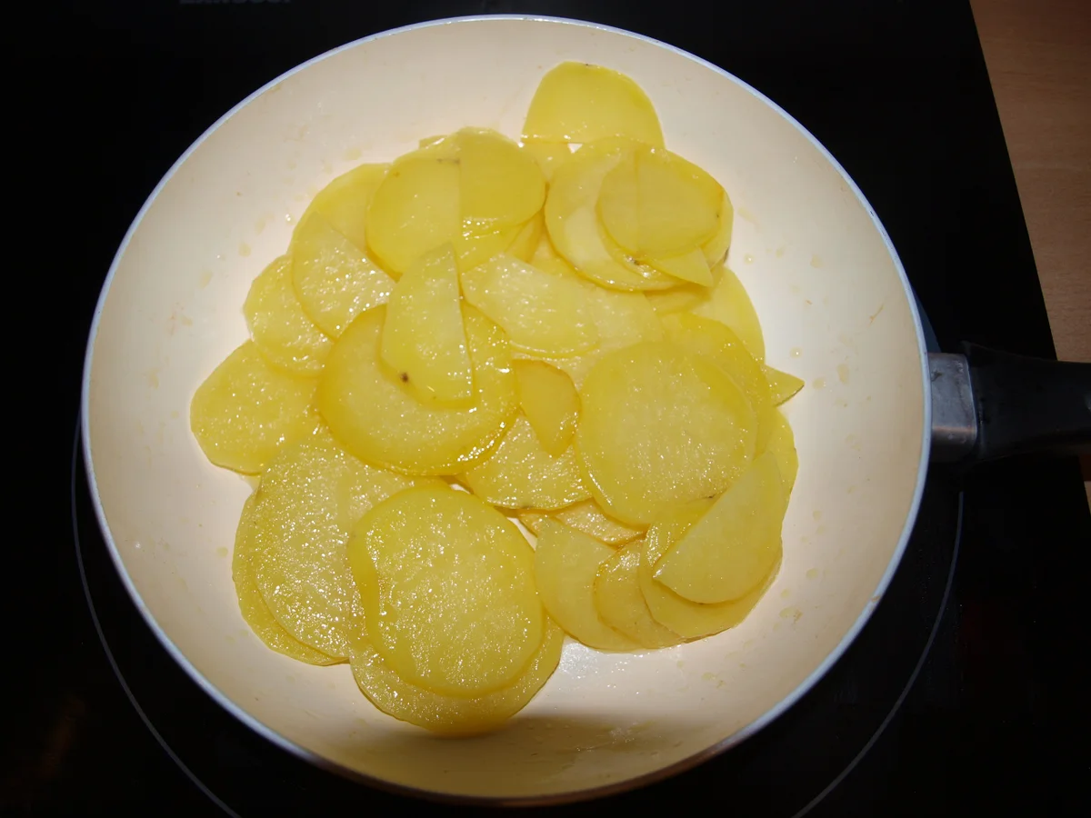 Rezept: Ei mit Serrano-Schinken und Kartoffeln (Huevos Rotos) Bild Nr. 299 Ei mit Serrano-Schinken und Kartoffeln (Huevos Rotos) - Rezept - Bild Nr. 299