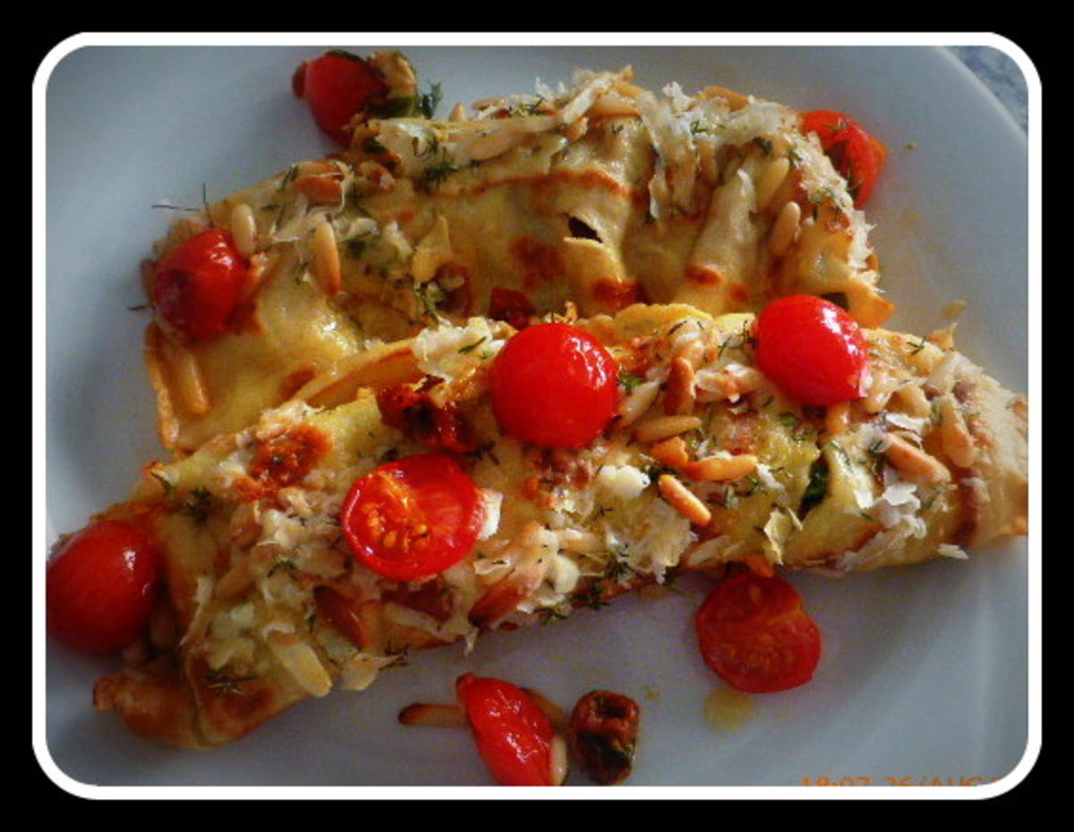 Parmesancrepes mit Mozzarella-Tomatenfüllung und Rucola - Rezept - Bild Nr. 569