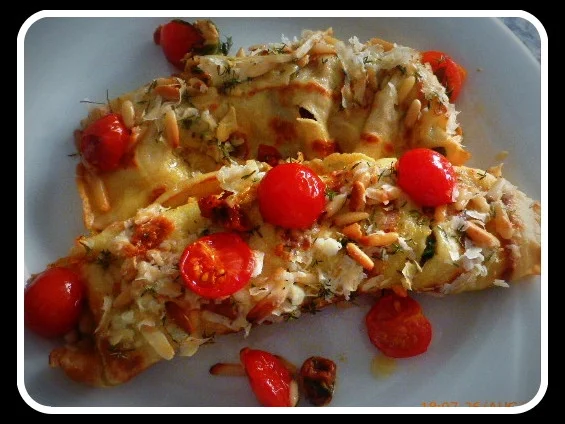 Parmesancrepes mit Mozzarella-Tomatenfüllung und Rucola - Rezept - Bild Nr. 569